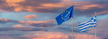 The European And The Greece  Flag At Sunset.