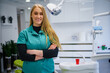© DusanJelicic - Portrait of female dentist .She standing in her dentist office.