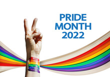 Pride Month 2022 Summer Concept With Pixel Stretch Effect, Mixed Media. Woman's Hand Shows A Sign Of Victory And A Rainbow LGBT Freedom Flag On A White Background.