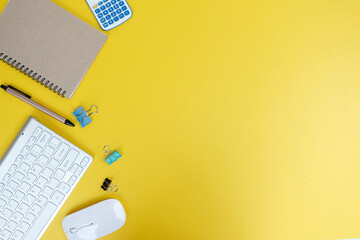 Poster - Top view of creative designer working desk with blank screen tablet, coffee cup and glasses on background. Top view with copy space for your text. Top view office desk table with blank notebook, coffe
