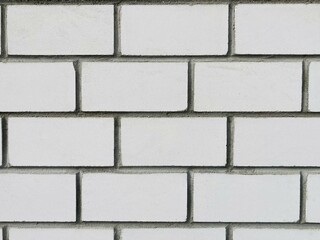 Wall Mural - a wall of white bricks