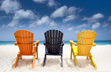 Wall Mural - Three colorful beach chairs on Caribbean coast