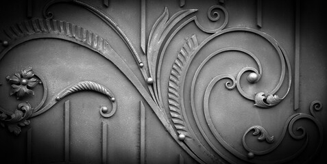 Wall Mural - Wrought-iron gates, ornamental forging, forged elements close-up.