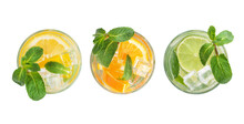 Different Types Of Mojitos In Glass Glasses On A White Background. View From Above