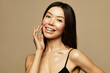 © Beauty Agent Studio - Asian young woman portrait on the beige background. Skin care.Beauty treatment and spa concept.