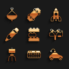 Sticker - Set Toy building block bricks, Music synthesizer, Radio controlled car toy, Slingshot, Wood easel, Pencil with eraser, Rocket ship and Whirligig icon. Vector