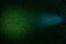 A Beam Of Blue Light On A Dark Green Gradient Background In Fine Grain