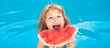 © Volodymyr - Funny excited child eats watermelon near the pool. Banner for header, copy space. Poster for web design.