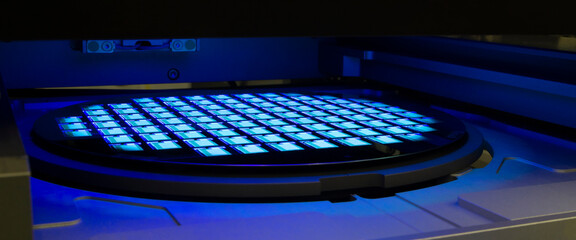 Poster - Silicon wafer with chips in UV lighting. Neon. Ultraviolet Lithography.