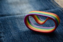 Rainbow Wristbands, Symbol Of Lgbtq , On Jeans, Concept For Lgbtq  Symbol Wearing To Attend The Celebration Events Of Lgbtq  Community Around The World, Soft And Selective Focus.