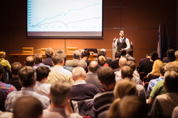 Wall Mural - Business speaker giving a talk at business conference meeting event.