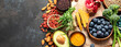 Healthy food clean eating selection on dark background.
