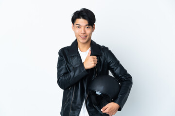 Wall Mural - Chinese man with a motorcycle helmet isolated on white background giving a thumbs up gesture