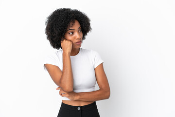 Wall Mural - Young African American woman isolated on white background with tired and bored expression