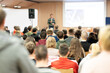 © kasto - Speaker giving presentation in lecture hall at university