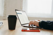 © muse studio - Work with finance accountant. Workplace a man uses a laptop report in the company electronic documents.