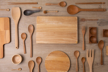 Wall Mural - kitchen utensils for cooking on the wooden table, food prepare concept