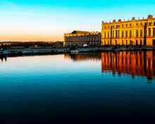 Versailles Castle In France At Sunset With Lake In Frontersailles Castle In France At Sunset With Lake In Front