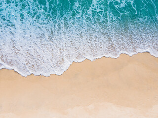 High angle view shots the waves and the beach in summer.