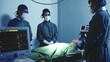 © sorapop - Dead patient surgeon doctor covering face on bed finished operate, Medical surgical doctor team performing surgery patient on operating room in hospital, surgery failed concept