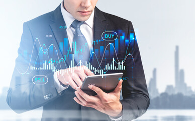 Poster - Businessman with tablet in hands, graph stock market and city view