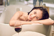 © View Stock - The bathtub beautiful young woman and wine