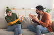 © Prostock-studio - Aggressive Muslim Husband Shouting At Scared Wife At Home