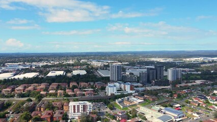 Wall Mural - Aerial drone view of Liverpool in Greater Western Sydney, NSW, Australia showing the high rise residential apartments looking toward Moorebank