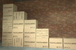 Declining bar chart made with boxes with fulfillment text. Conceptual 3D rendering