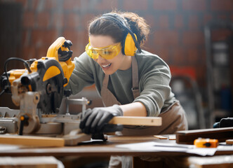 Wall Mural - woman carpenter in workshop