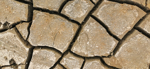 Sticker - Dry riverbed, with arid and cracked soil because of drought, due to climate change