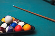 Pool table with rack of balls