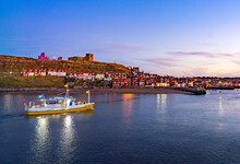 Whitby Harbour At Twilight With Boat.