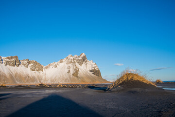 Wall Mural - Sunny autumn day at mountain Vestrahorn in Iceland