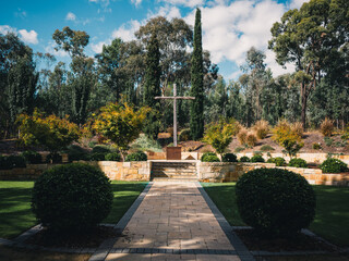 Wall Mural - Cross in the garden