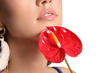 Wall Mural - Beautiful woman with anthurium flower on white background, closeup