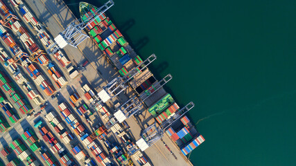 Wall Mural - Aerial view container ship freight shipping at port, Global business logistic import and export freight shipping transportation oversea worldwide, Container vessel cargo freight ship international.