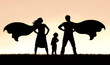 Silhouette of Superhero Mother and Father with Small Child