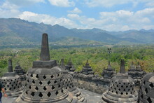 Majestic Tall Mountains With Two Volcanoes Surrounding The Borobudur Temple In Central Java, Indonesia