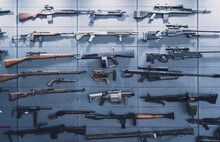 Collection Of Rifles And Carbines On The Wall