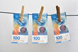 hanging 100 swiss franc banknote
