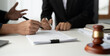 © Natee Meepian - Businessman and lawyer discuss the contract document. Treaty of the law. Sign a contract business.