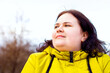 © KatMoy - Happy attractive chubby overweight Caucasian woman smiling portrait outdoors. Cheerful pretty body positive person laughing during walk in the park.