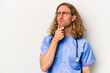 © Asier - Young nurse caucasian man isolated on blue background looking sideways with doubtful and skeptical expression.