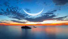 Ramadan Concept - Abstract Background With Crescent Moon Over The Sunset Clouds