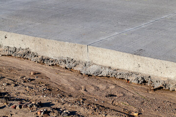 Wall Mural - a thick layer of a new road made and built of concrete slabs