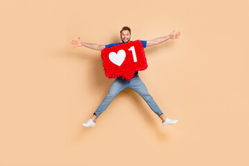 Wall Mural - Full length portrait of excited overjoyed person make star figure isolated on beige color background