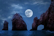 Famous arches of Los Cabos. Mexico. Baja California Sur. Rocky formations at moonlight  background.