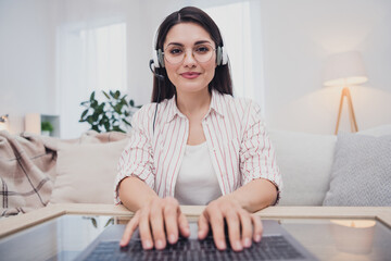 Poster - Portrait of attractive focused skilled woman answering call insurance support care typing email invoice at home indoors