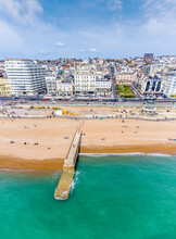 An Aerial View Above A Breakwater On The Seashore At Brighton. UK In Early Summertime
